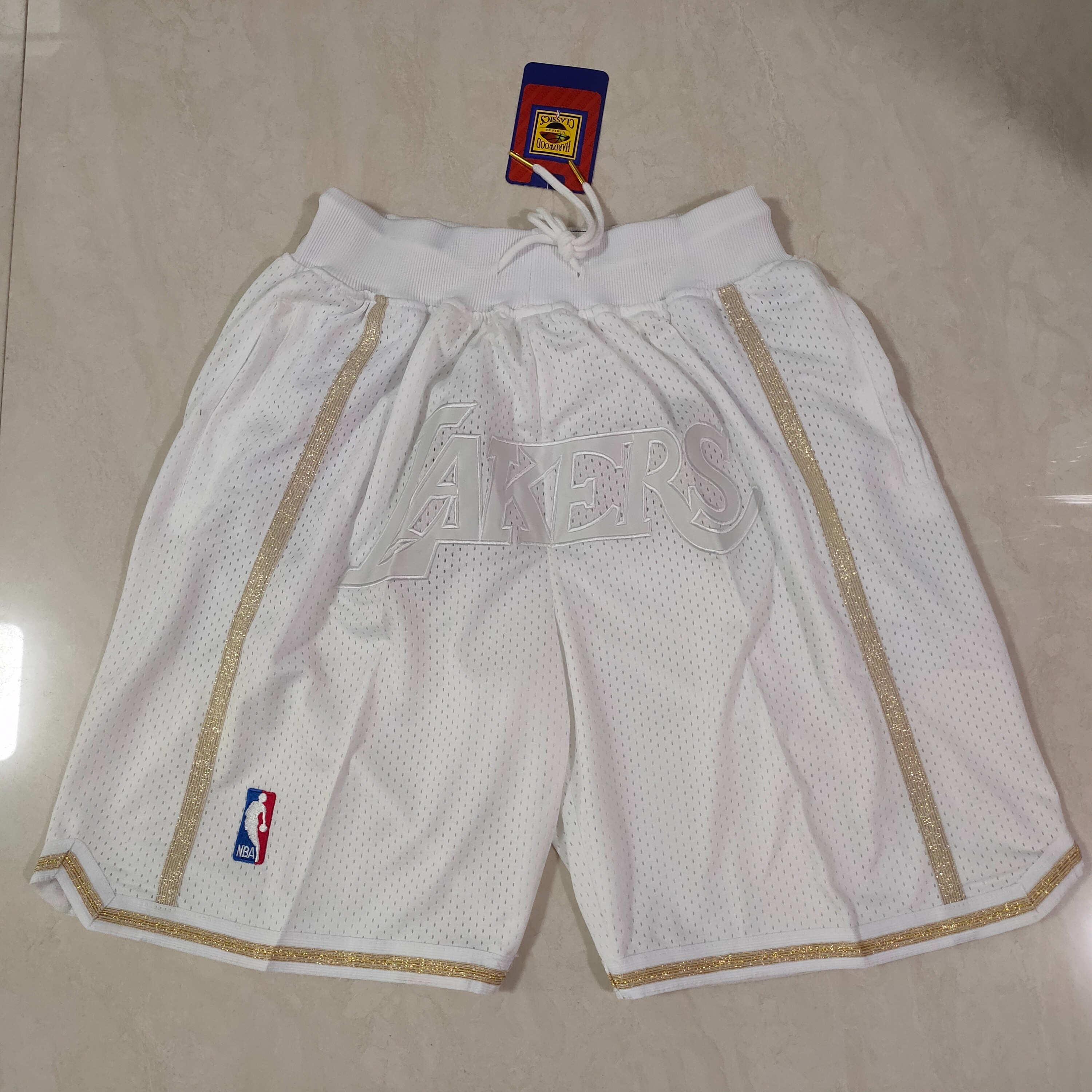 NBA Los Angeles Lakers Sunday Whites 2002-03 Chick Hearn le Basketball Shorts - Limited Shorts | NBA Shorts NBA Los Angeles Lakers Sunday Whites 2002-03 Chick Hearn le Basketball Shorts - Limited Shorts | NBA Shorts